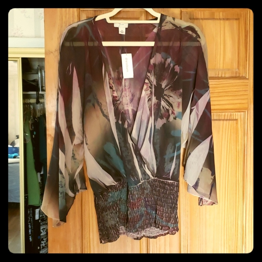 Womans never worn blouses and dresses .Tags still